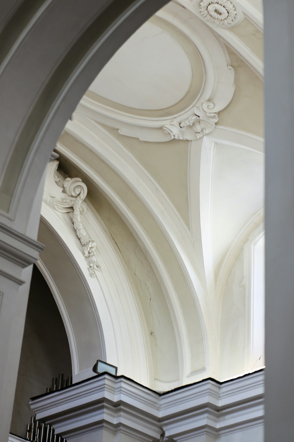 a clock on the side of a wall in a building