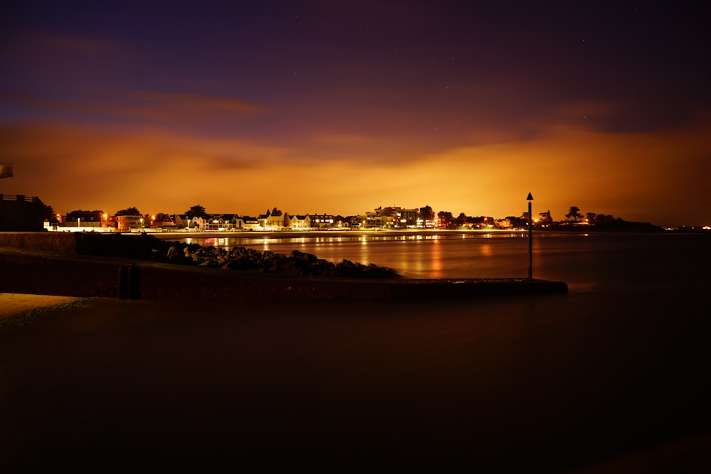 a view of a city at night from across the water