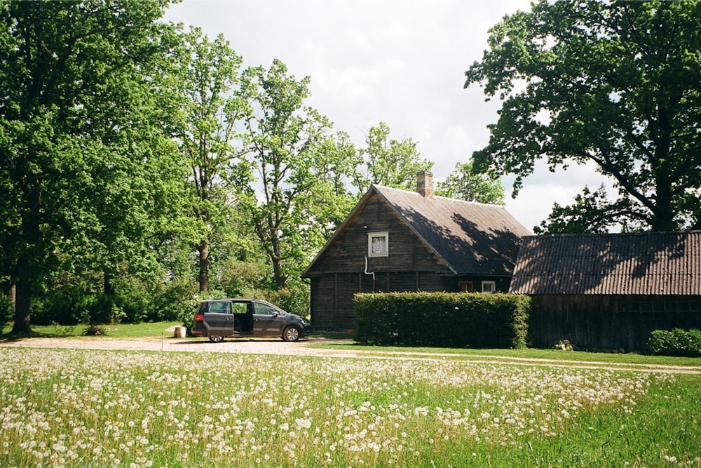 a car is parked in front of a house