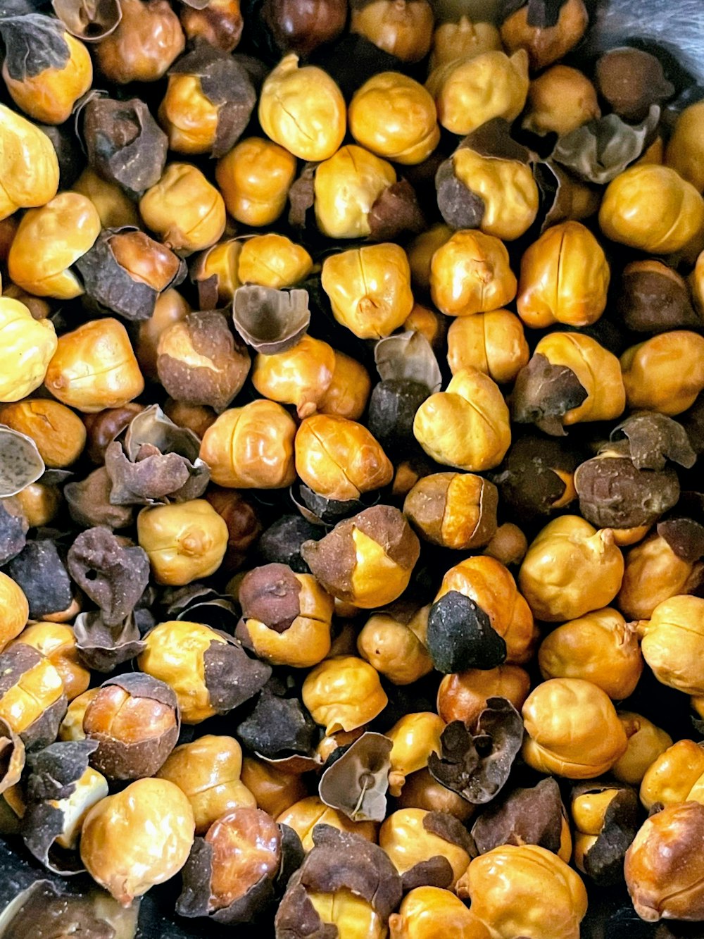 a bunch of nuts that are in a bowl