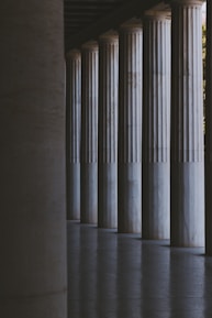 the columns of a building are lined with columns