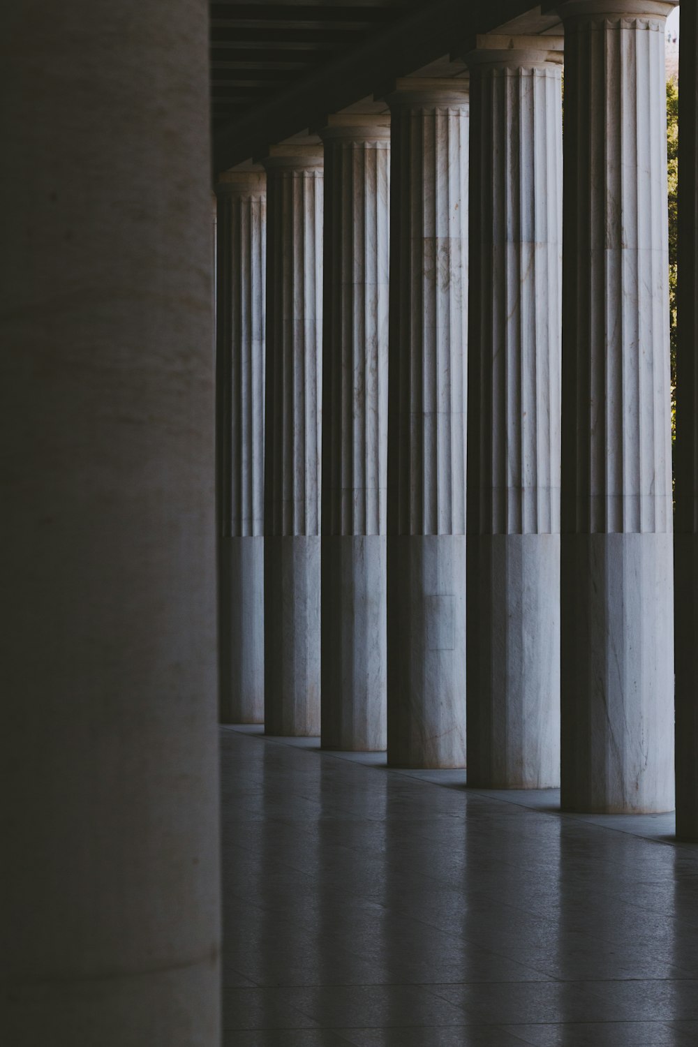 the columns of a building are lined with columns