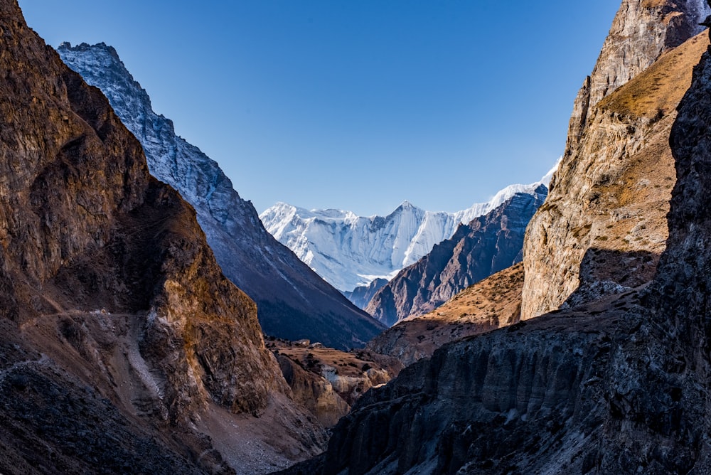 a view of a mountain range from a canyon