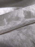 A close-up of fabric showcasing softness and quality craftsmanship.