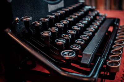 a close up of an old fashioned typewriter