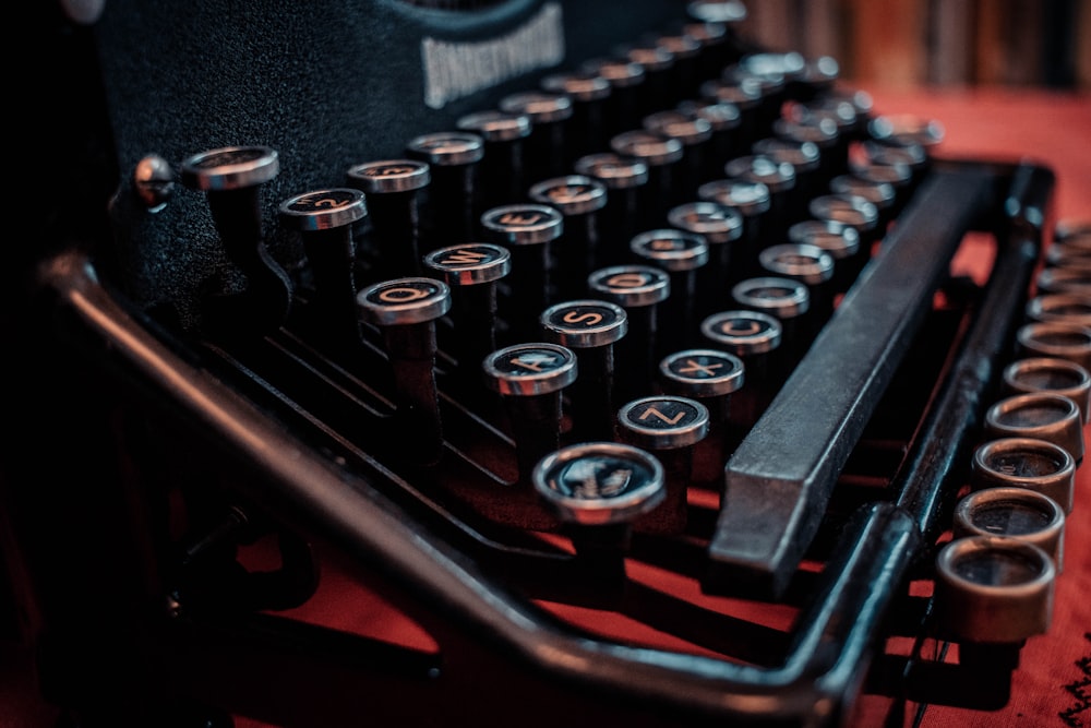 a close up of an old fashioned typewriter