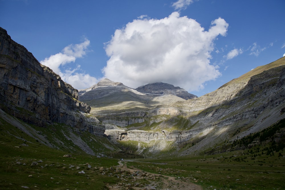 a view of a mountain range from a valley