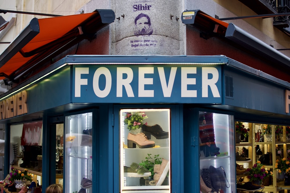 a store front with a sign that says forever