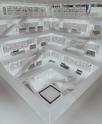 a room filled with lots of shelves filled with books