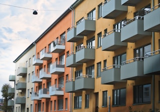 an apartment building with balconies and balconies on the balconies