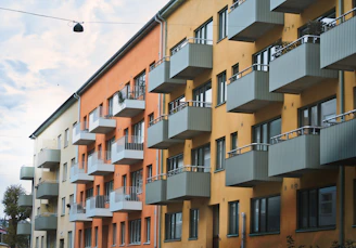 an apartment building with balconies and balconies on the balconies