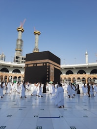 a group of people standing in front of a building