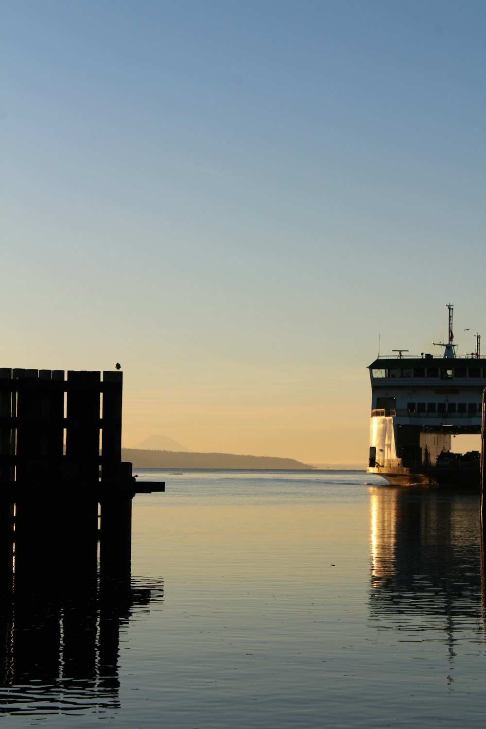 a large boat floating on top of a large body of water