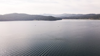 a large body of water surrounded by mountains