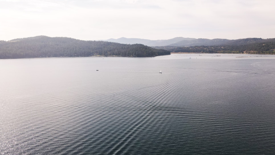 a large body of water surrounded by mountains