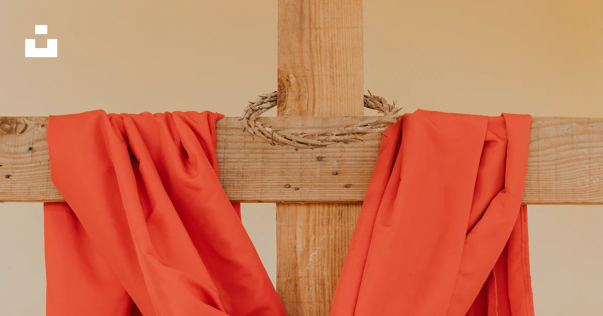 A cross with a red cloth draped around it photo – Free Clothing Image ...