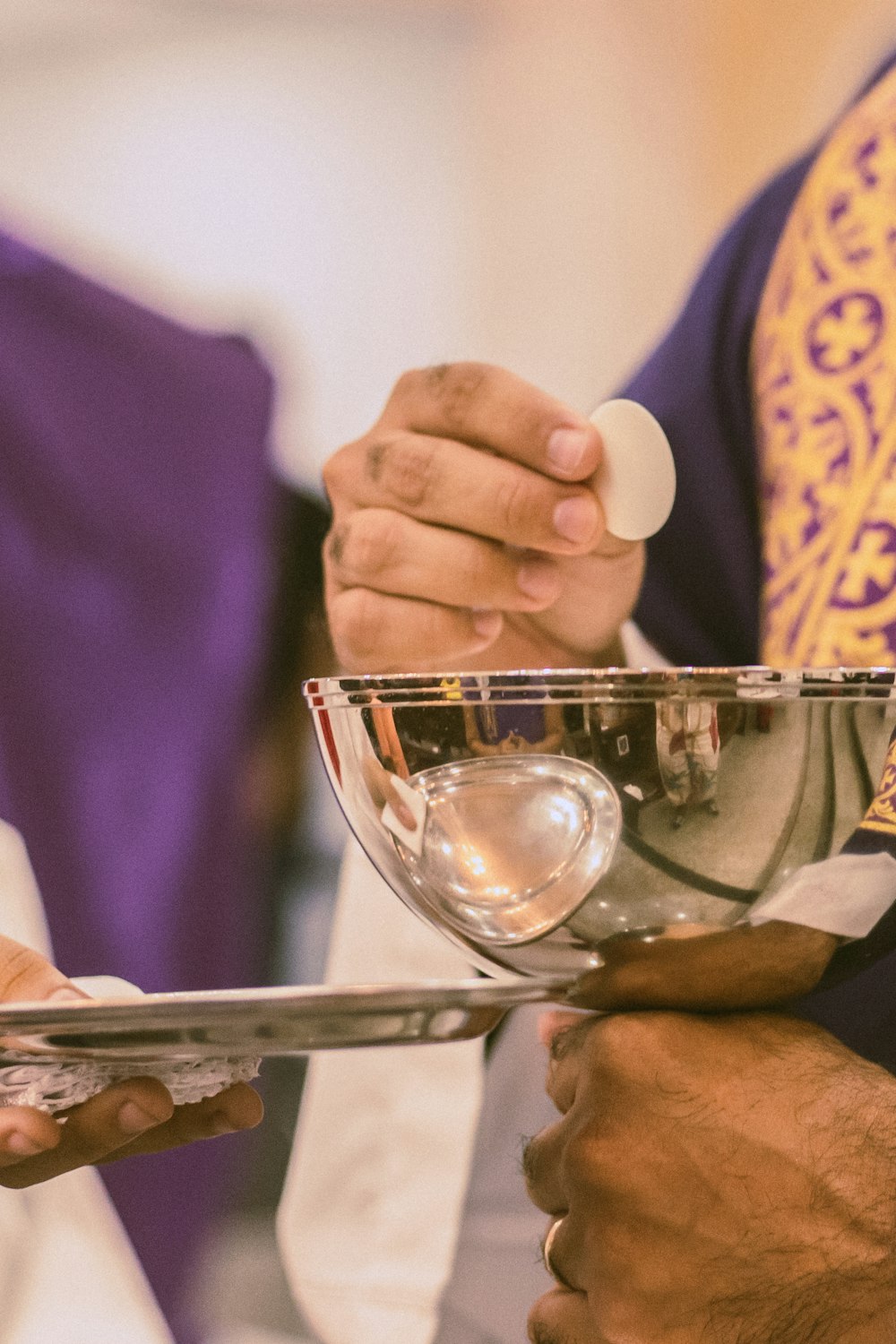 a close up of a person holding a bowl