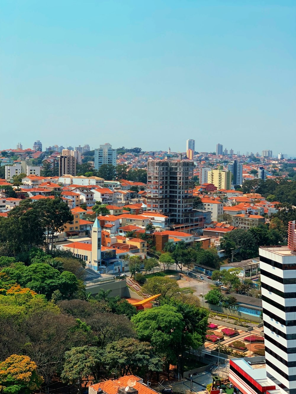 a view of a city with tall buildings