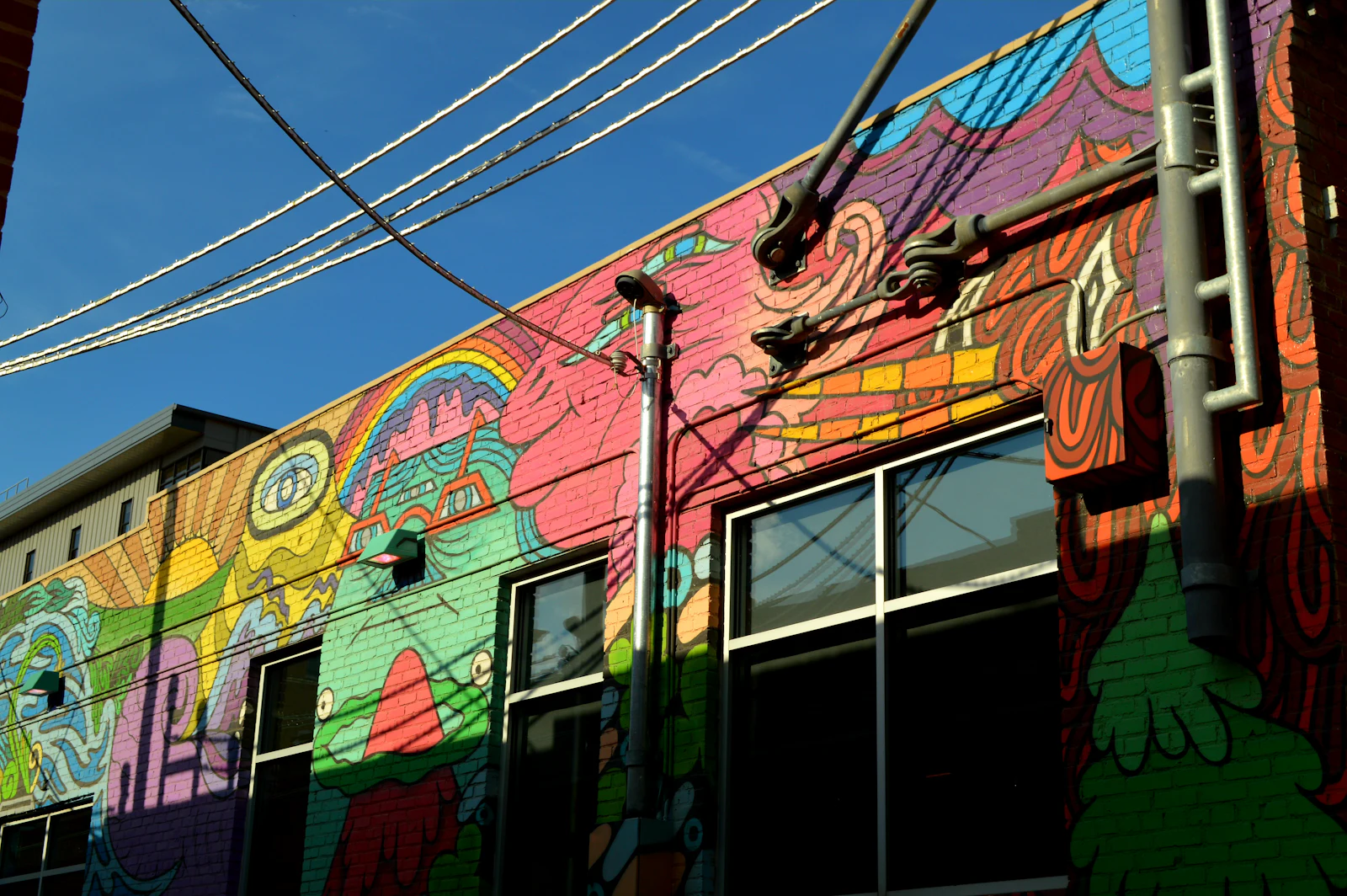 A colorful mural on the side of a building in Lincoln, Nebraska