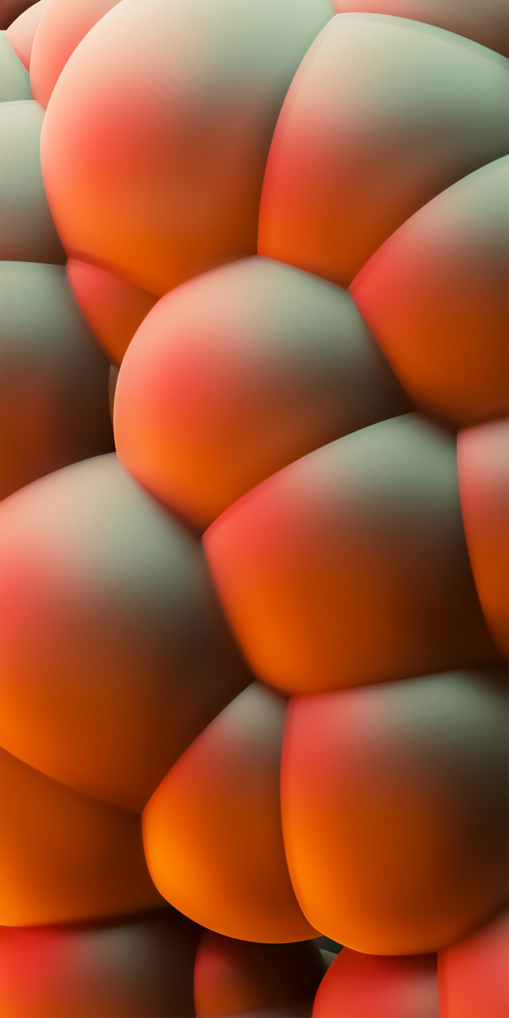 a close up of a bunch of orange and pink balls