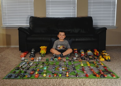 A child playing with safe, educational toys, smiling happily.