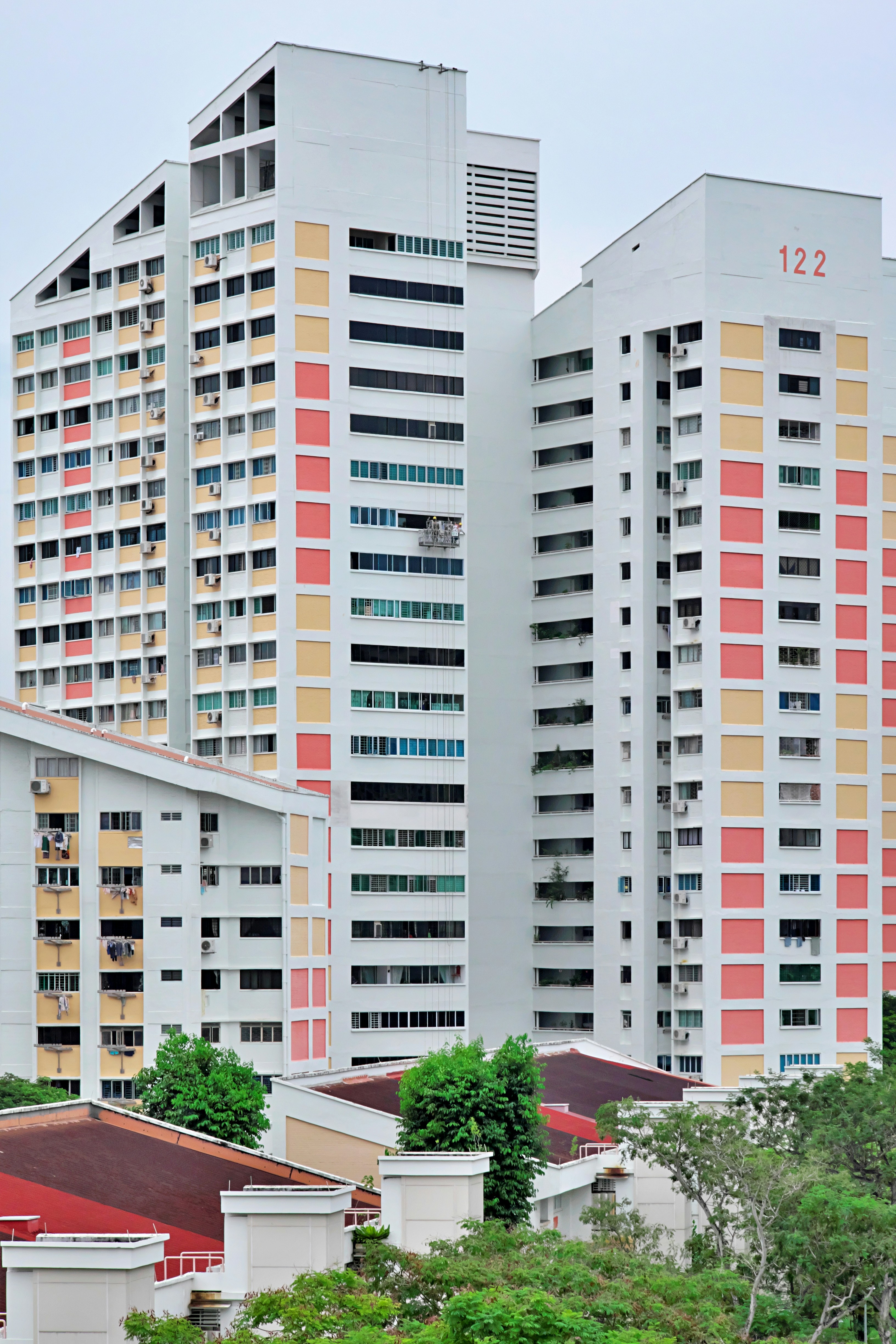 a row of multicolored buildings in a city