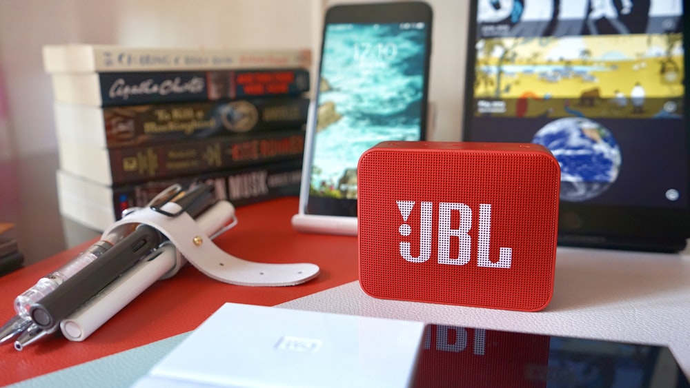 a red box with the word ybl on it sitting on a table next to