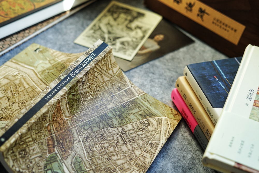 a bunch of books that are sitting on a table