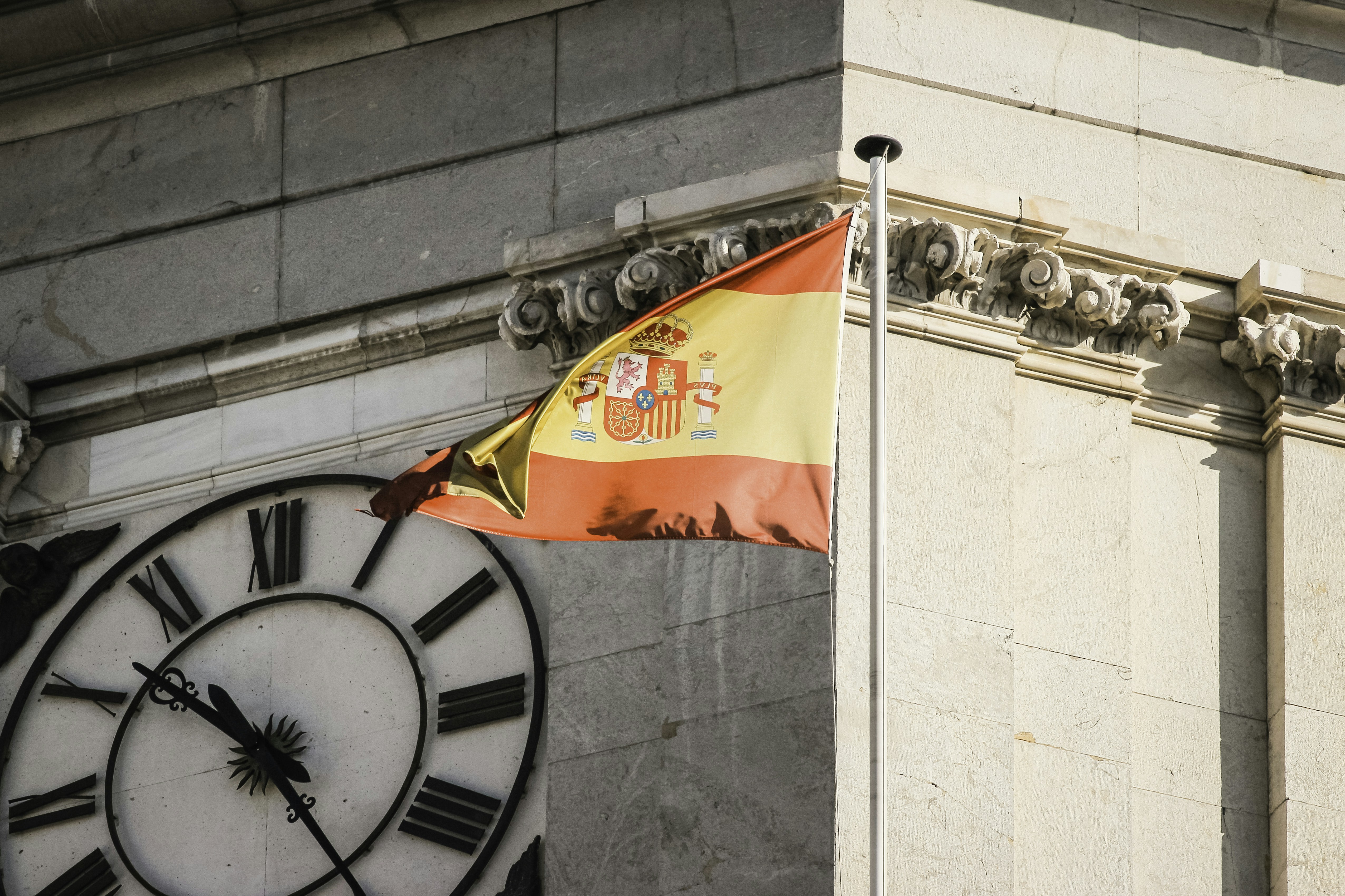 a large clock on the side of a building