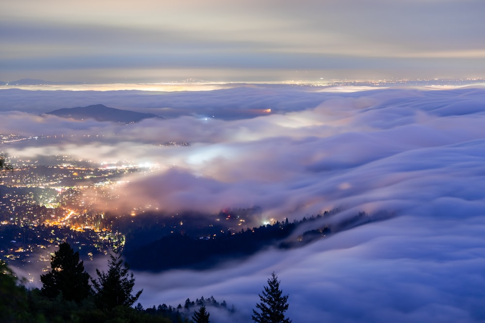 a view of a city from above the clouds