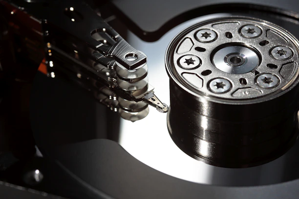 a close up of a hard drive with a guitar