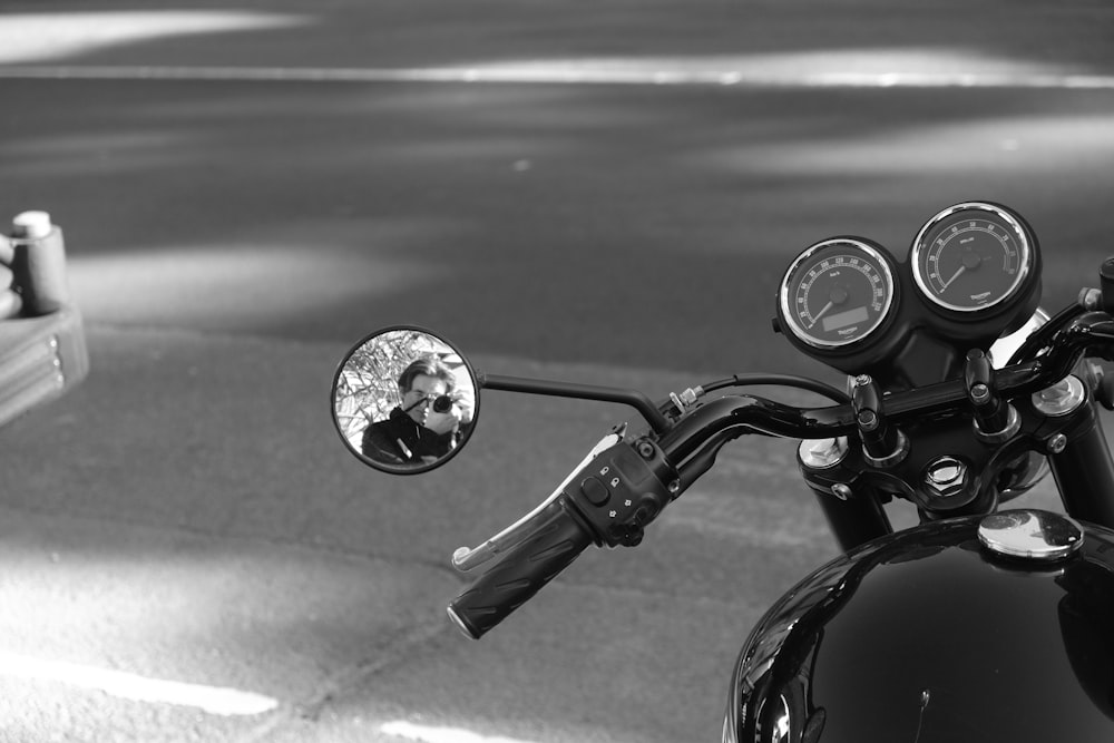 a motorcycle parked on the side of a road