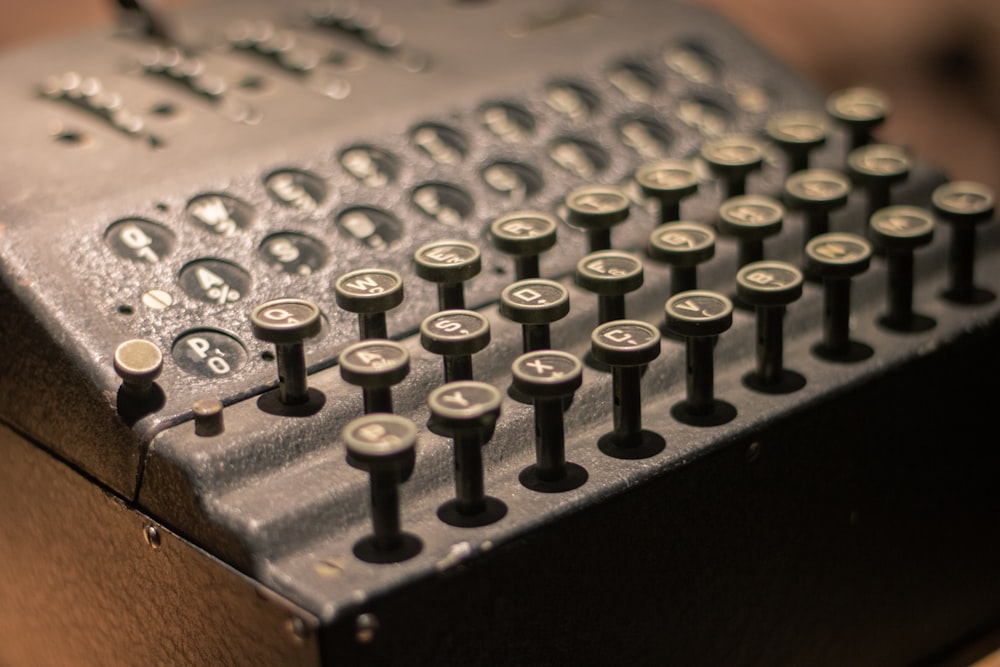 a close up of an old fashioned typewriter