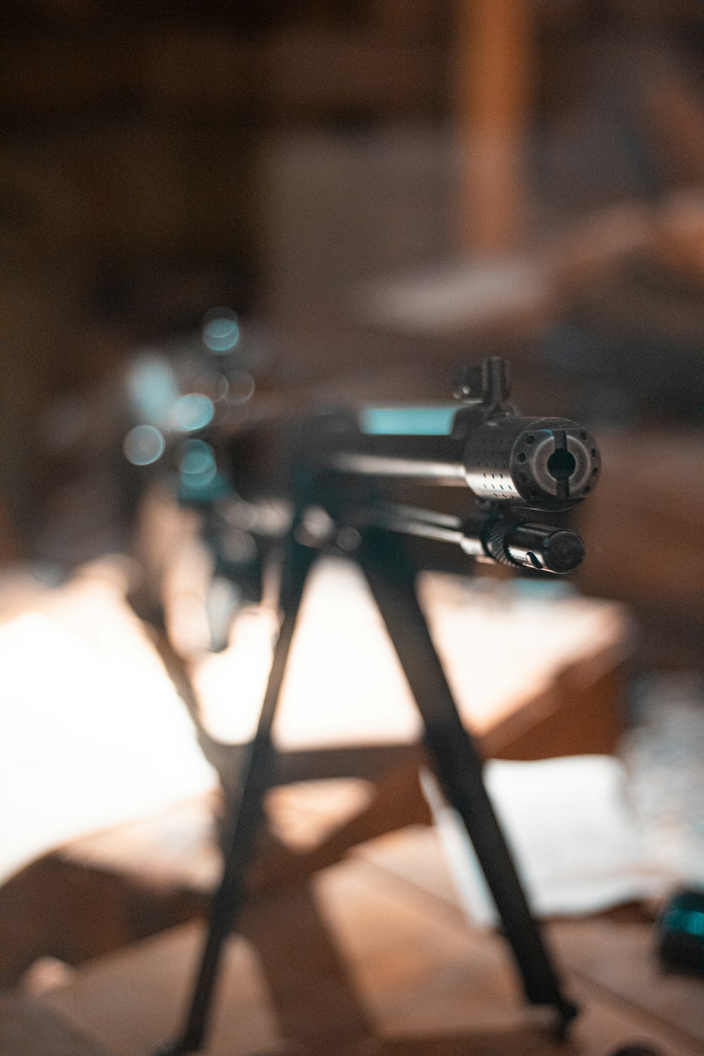 a close up of a toy gun on a table