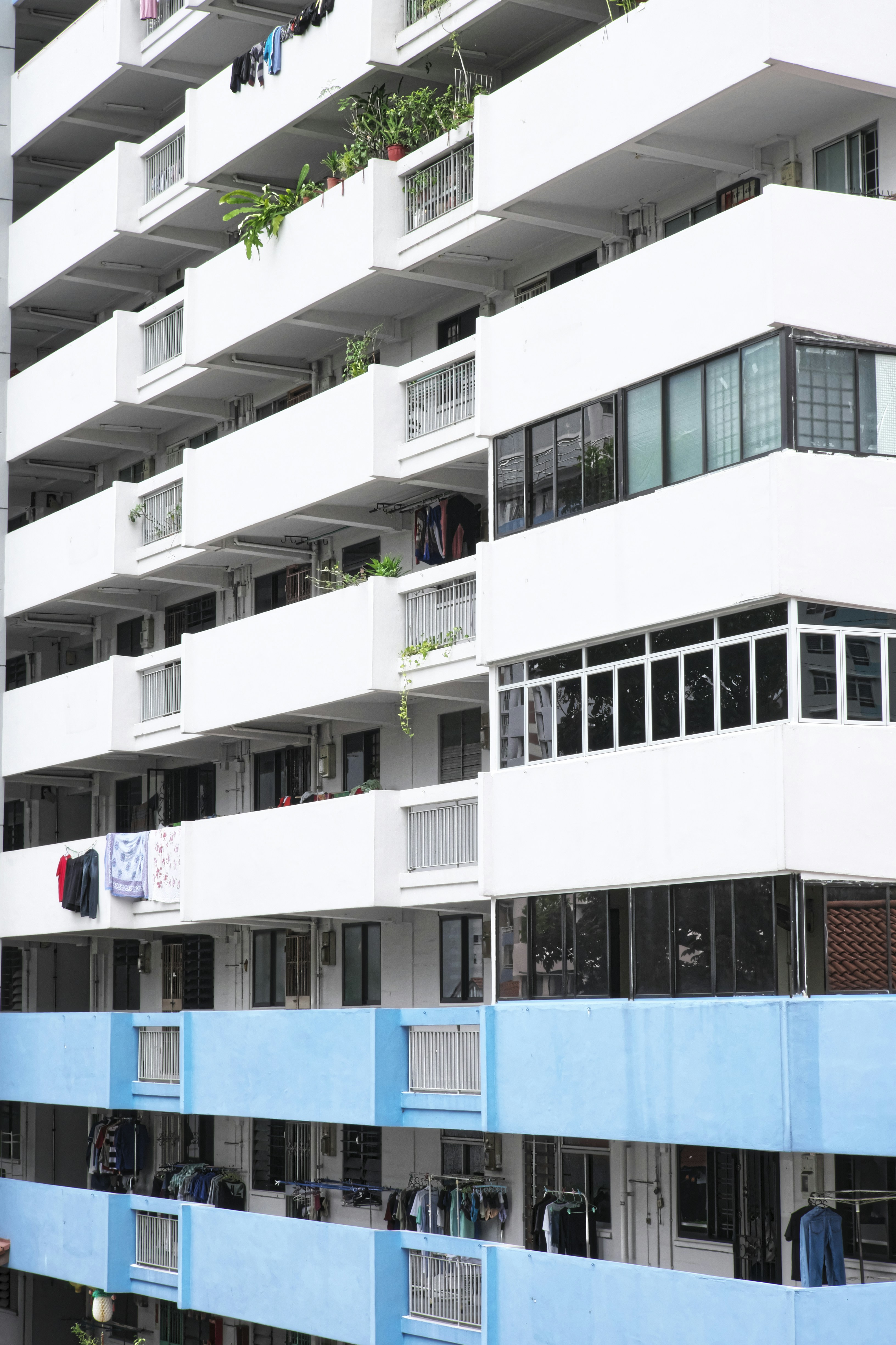 an apartment building with balconies and balconies on the balconies