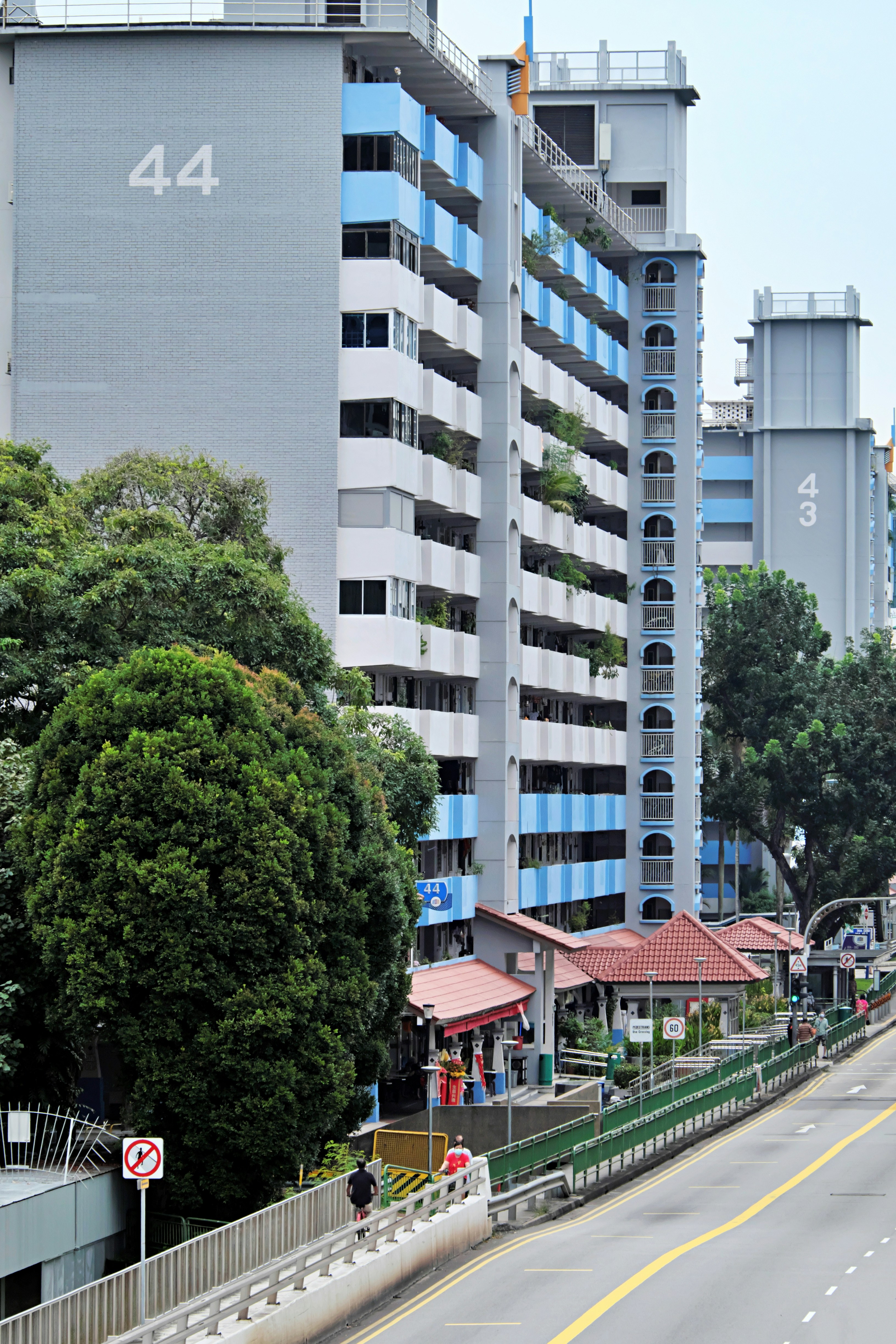 a city street with tall buildings on both sides