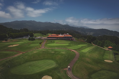 Spacious clubhouse interior at Top of the Pines Golf Club with stone detailing.