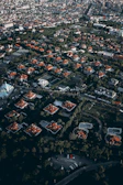 Aerial view of Sevilla cityscape highlighting residential areas managed by Claveviva.
