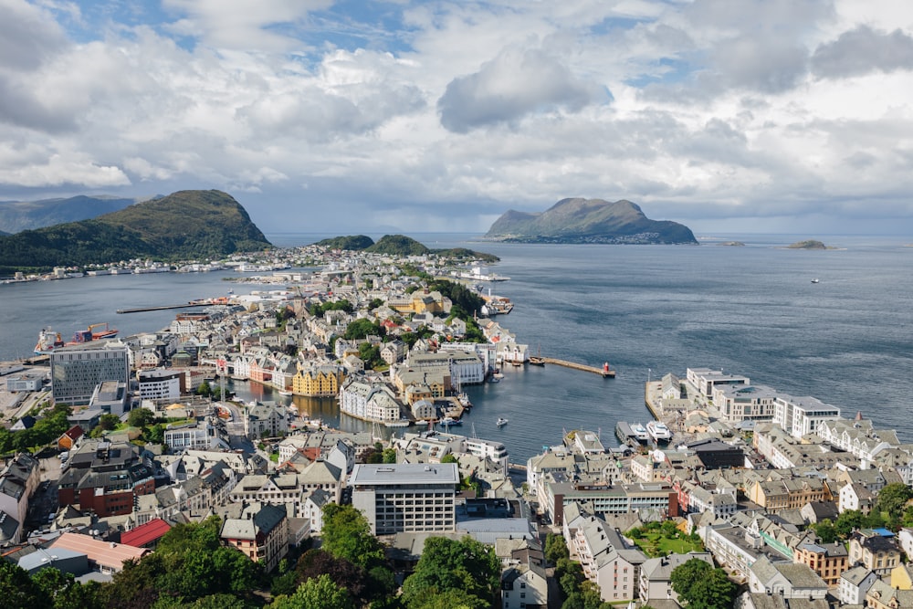 an aerial view of a city by the ocean