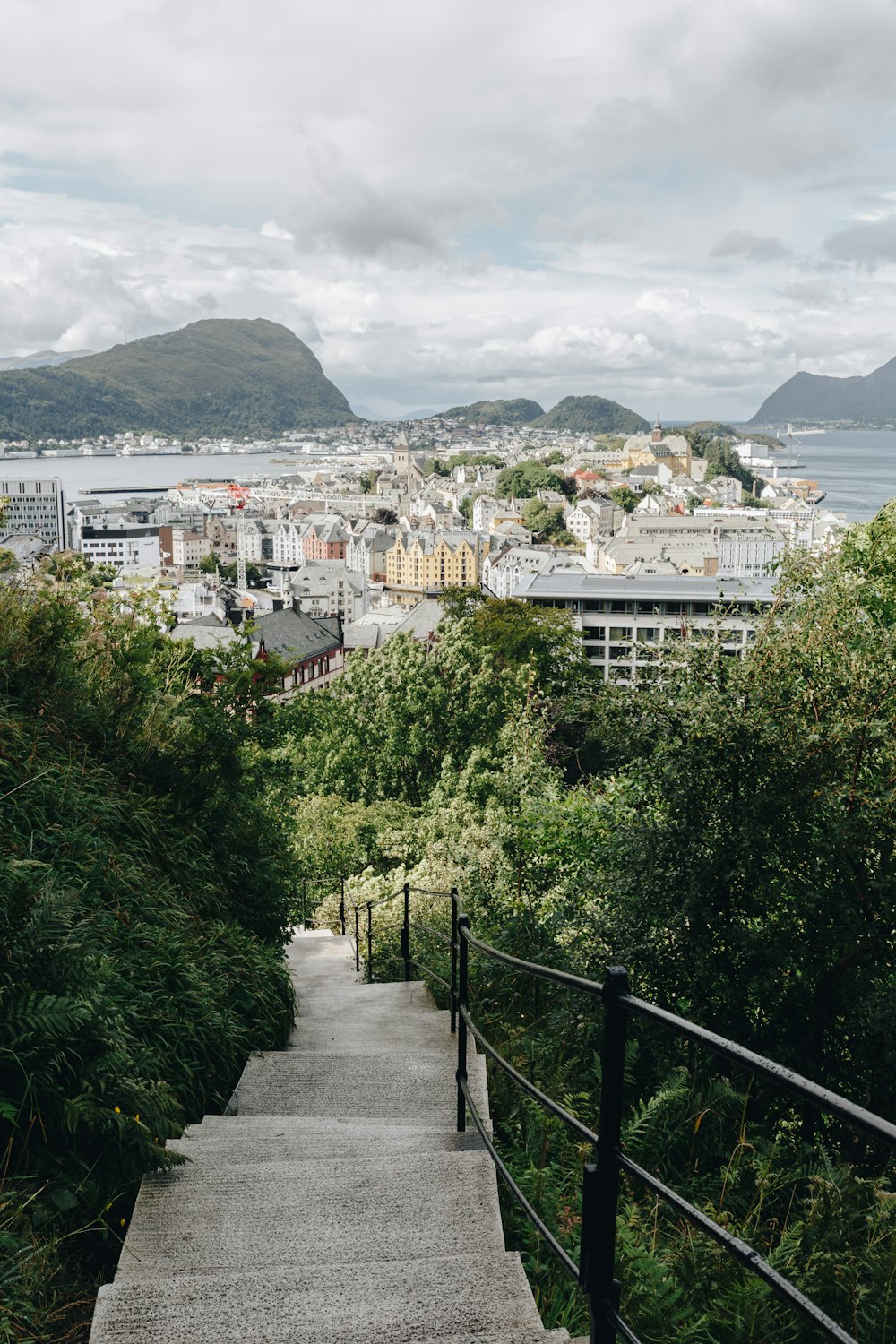 a view of a city from the top of a hill