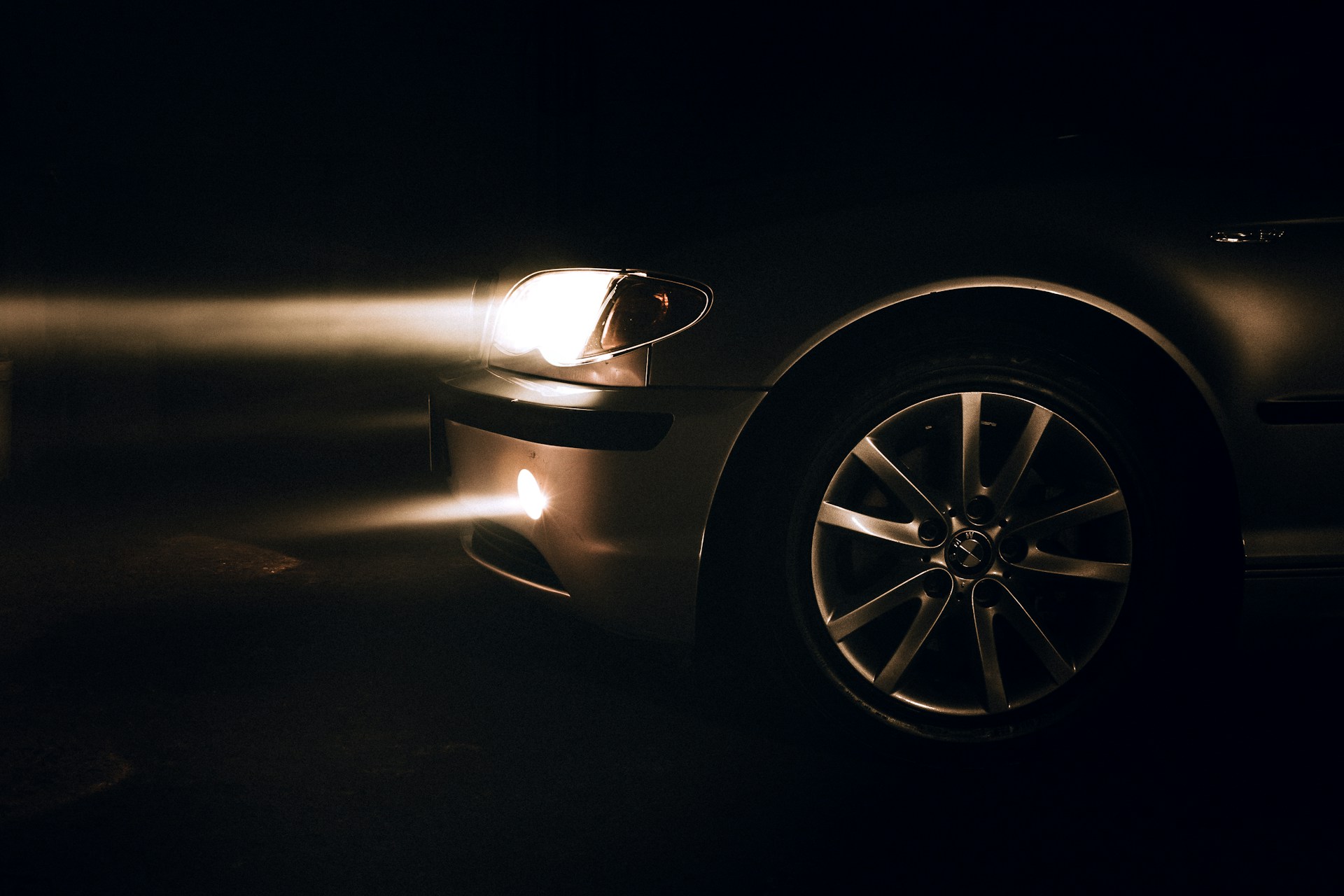 a close up of a car in the dark
