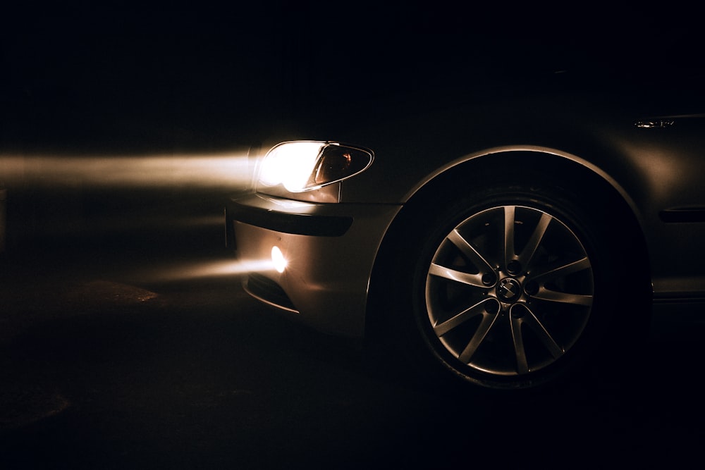 a close up of a car in the dark