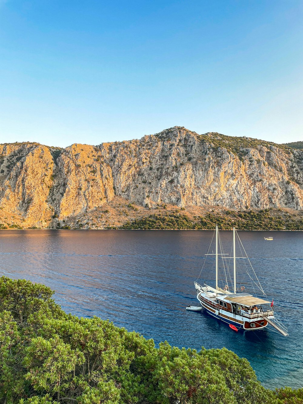 a boat floating on top of a large body of water