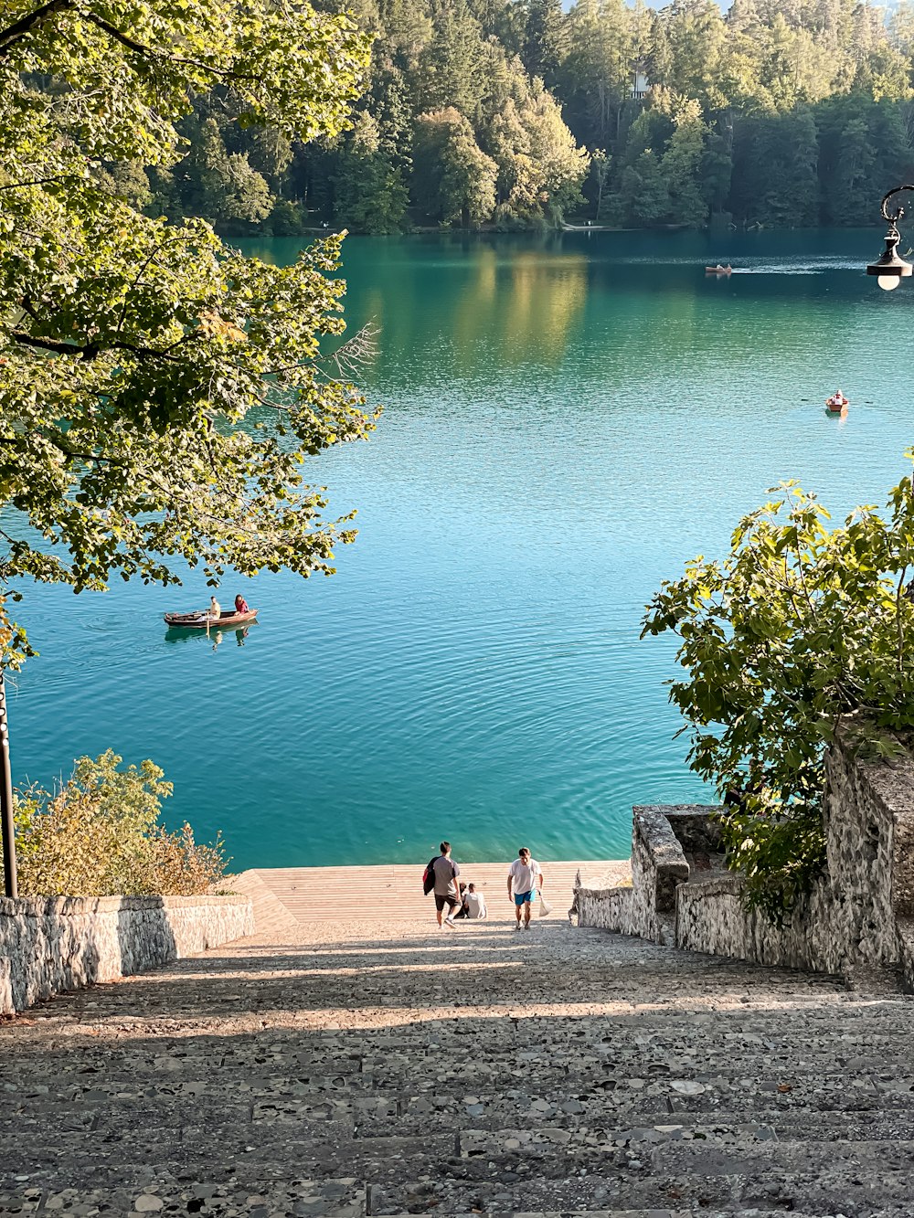 a couple of people that are walking down some steps