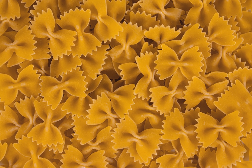 a close up of a bunch of pasta shells