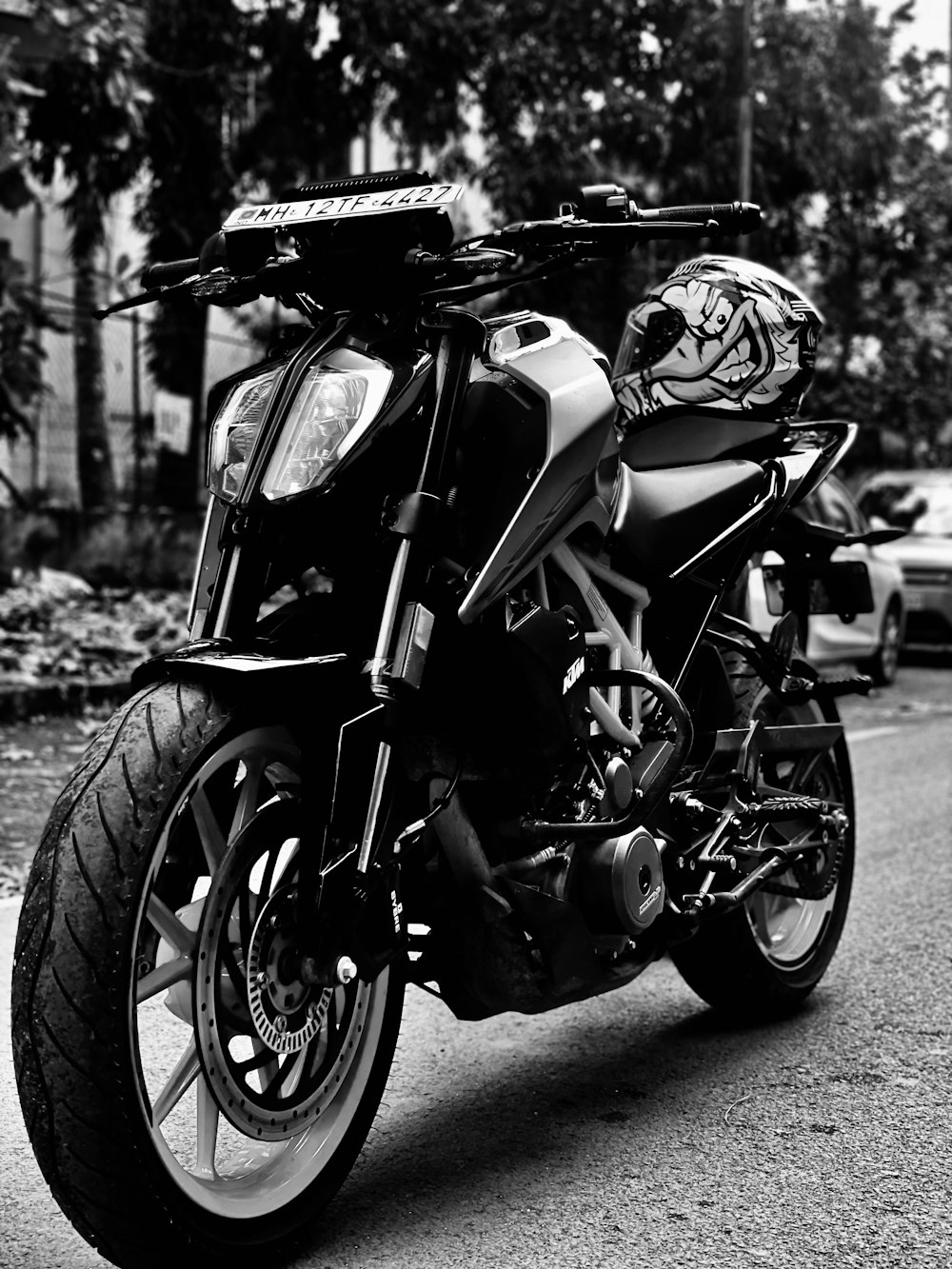 a motorcycle parked on the side of the road