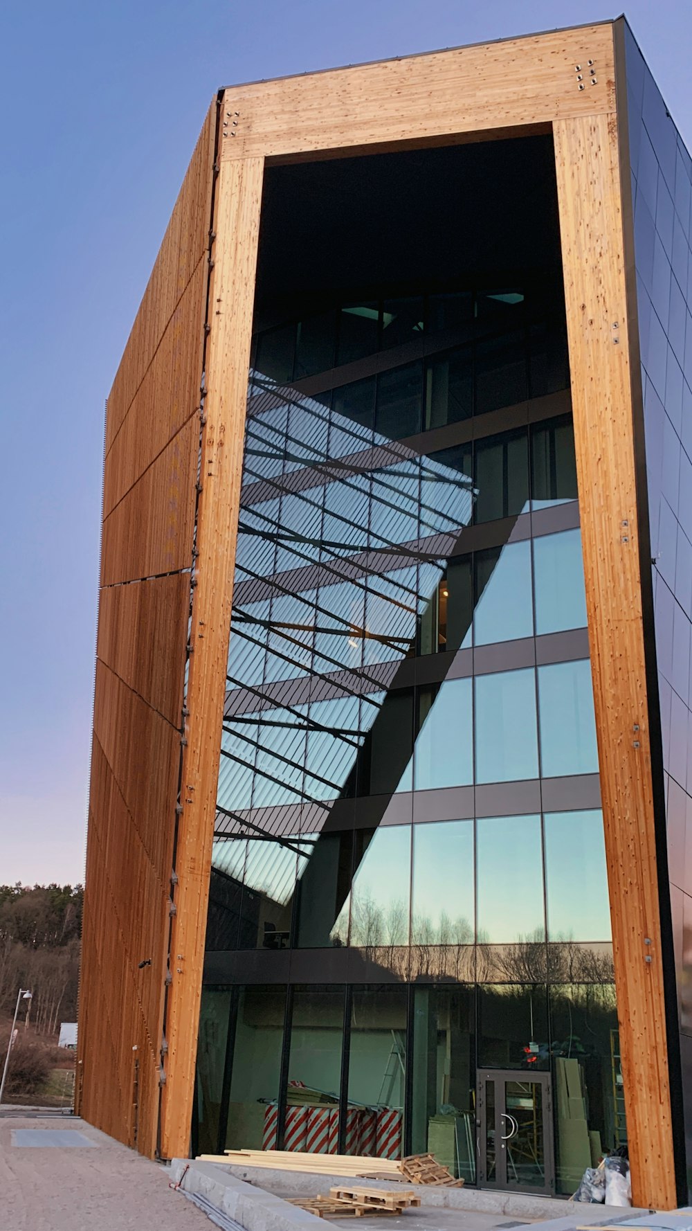 a tall building with a spiral staircase going up it's side