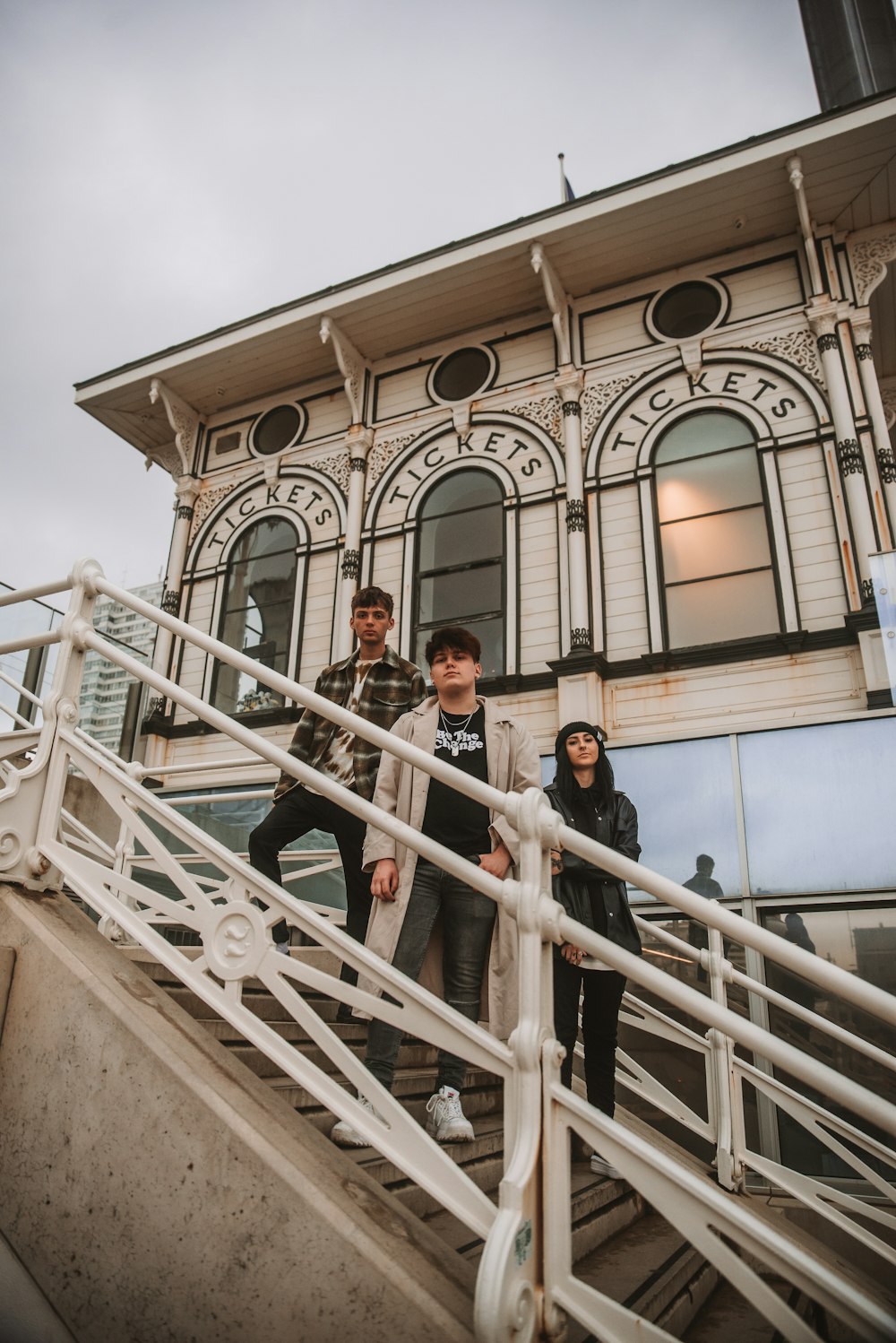 a group of people standing on a set of stairs