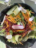 A vibrant salad made with seasonal vegetables and herbs.