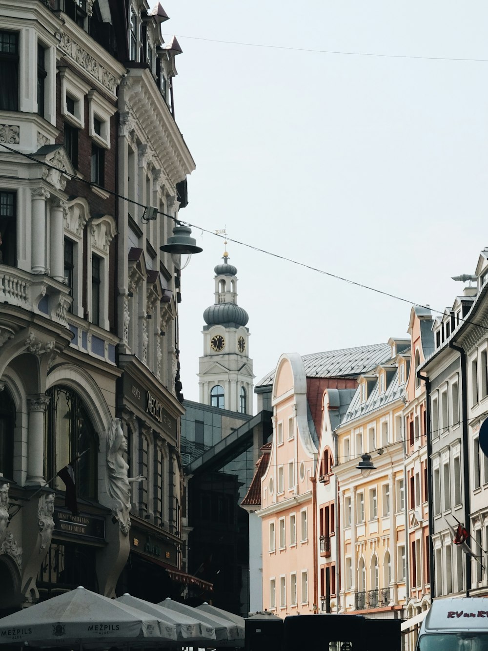 a city street filled with lots of tall buildings